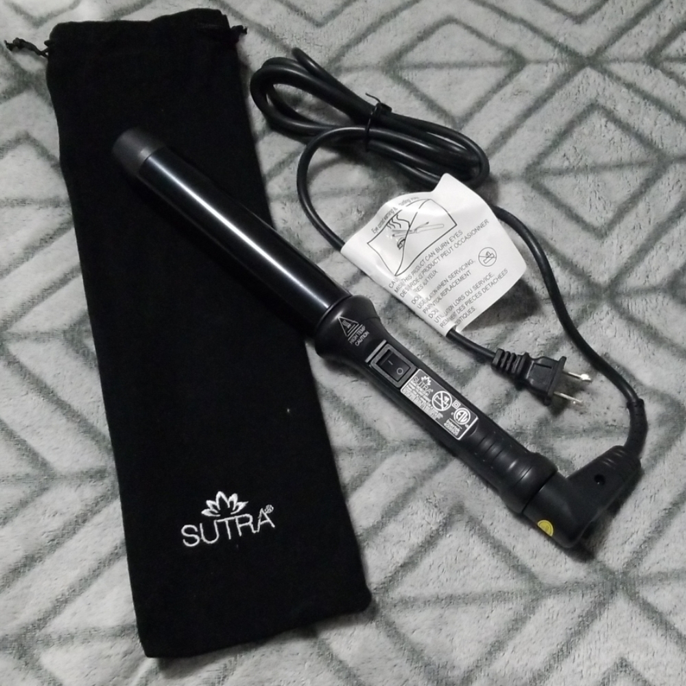 Sutra clipless curling iron with cool tip.